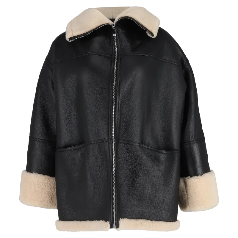 Totême Two-tone Shearling Zipped Jacket in Black Leather